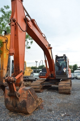 เปิดประมูลรถขุดแบคโฮ