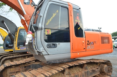 เปิดประมูลรถขุดแบคโฮ