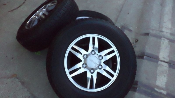 ขายแม็กISUZU ขอบ 16 นิ้ว พร้อมยาง บริดสโตน245/70/16 ปี10 1 ชุด สวยมาก