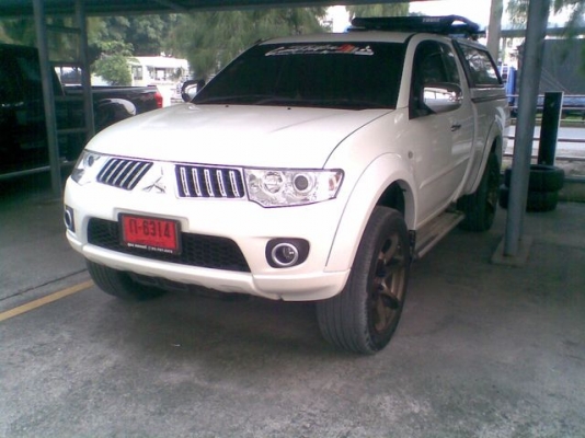 ขายยางอะหลั่ยTRITON PLUS ขอบ 16 นิ้ว พร้อมยาง 245/70/16 ปี12  ใหม่ครับ