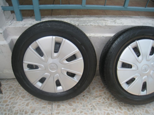 ขายกะทะล้อ  Mitsubishi Mirage ขอบ 14 +ฝาครอบ+ยางปี 12 (081-3747940)