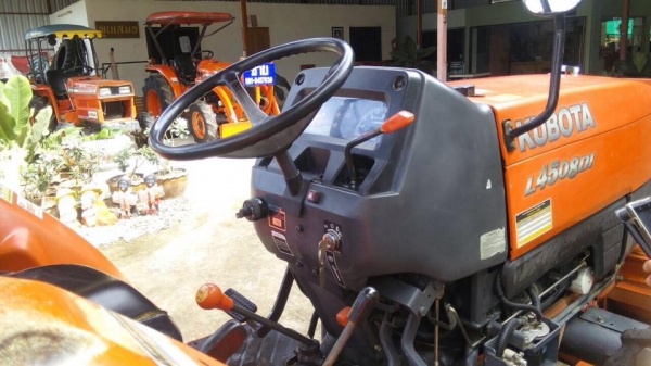ขายรถไถKubota L4508DI (4WD) พร้อมใบมีดหน้าและผานบุกเบิกช้าง รถไร่ สีเดิมพร้อมใช้งาน