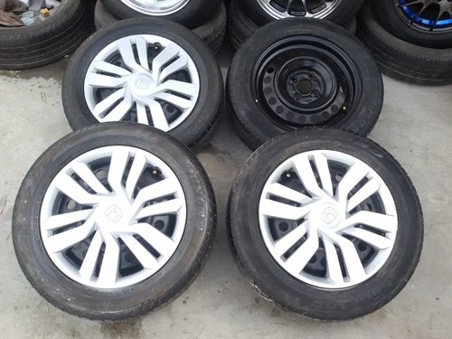 ขายล้อกะทะขอบ15 HONDA 4รู100 พร้อมยางและฝาครอบ 4 ล้อ