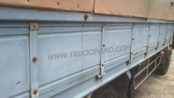 ISUZU Npr กระบะคาร์โก้ ยางเรเดียนใหม่6เส้น พรัอมโครงหลังคา คัชซีสวยตลอดเส้น ล้อ5น้อต แอร์ พวงมาลัยพาวเวอร์ หัวเก่งมีผุนิดหน่อย ภาษีไม่ขาด