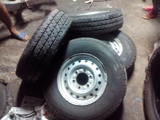 ขายยางขอบ14 ปี13ดอกเต็ม พร้อมกะทะ6รู 4วง4000