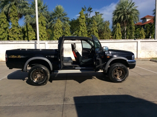 ขายรถกระบะฟอร์ด เรนเจอร์โฟวิลแคปเปิดได้ ปี03 เครื่องวาง 1JZ เทอร์โบ เกียร์ธรรมดา ติดแก๊สLPG ระบบเกียร์โฟวิลยังอยู่ครบ เพาเวอร์ ไฟฟ้า airbag/abs ภายในเดิมๆวิทยุCD ตัวถังบางเดิมทั้งคันสีเงามีริ้วรอย แม็กสวย8"ยางโฟ34" ยางดี โช๊คอัพแต่ง คัสซีสวย รถข