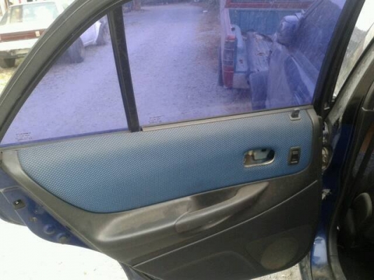 ขาย ประตู มาสด้า โปรทีเจ 323