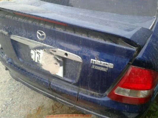 ขาย ประตู มาสด้า โปรทีเจ 323