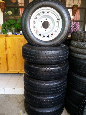 ล้อกะทะพร้อมยาง 215 70 15 ถอดป้ายแดง มีตุ่ม สวยๆ ปี 15