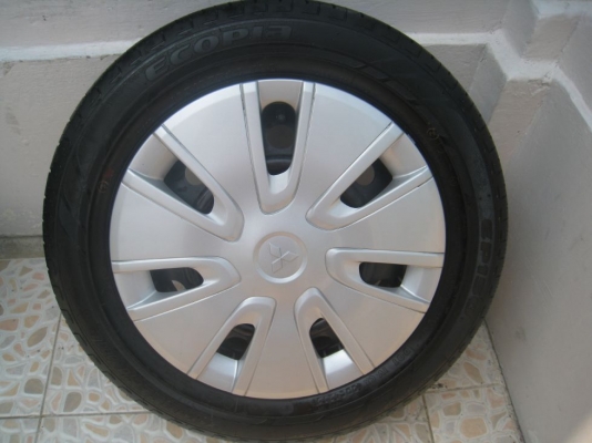 ขายกะทะล้อ  Mitsubishi Mirage ขอบ 14"  4/100 +ฝาครอบ+ยางปี 12 (081-3747940)