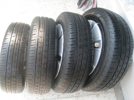 ขายกะทะล้อ  Mitsubishi Mirage ขอบ 14"  4/100 +ฝาครอบ+ยางปี 12 (081-3747940)