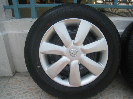ขายกะทะล้อ nissan almera ขอบ14  4/100 +ฝาครอบ + ยางธันวาคมปี12 (081-3747940)