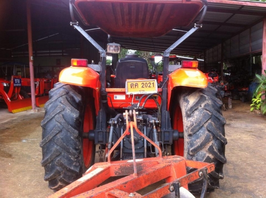 ขายรถไถ Kubota M7040 (4WD) พร้อมดันหน้า+ผานพรวนช้าง รถบ้าน เดิมๆ พร้อมใช้งานครับ