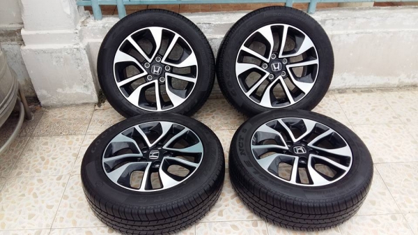 ขายล้อแม็กป้ายแดง civic fb mc 16"พร้อมยางปี14 สนใจติดต่อเล็กคลองสามครับ 081-3747940