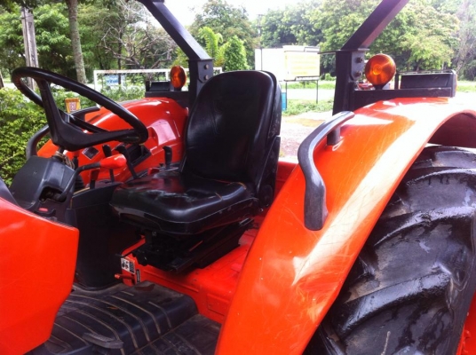 ขายรถไถ Kubota M7040 (4WD) พร้อมดันหน้า+ผานบุกเบิกช้างDP263J รถสวย พร้อมใช้งานครับ