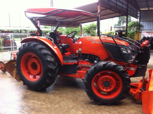 ขายรถไถ Kubota M7040 (4WD) พร้อมดันหน้า+ผานบุกเบิกช้างDP263J รถสวย พร้อมใช้งานครับ