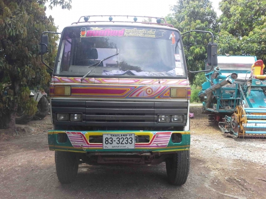 รถเกี่ยวข้าวพร้อมรถเทรเลอร์บรรทุก