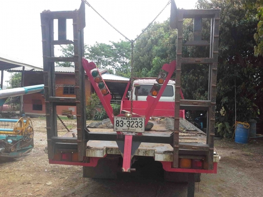 รถเกี่ยวข้าวพร้อมรถเทรเลอร์บรรทุก