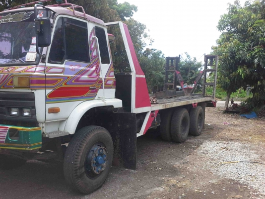 รถเกี่ยวข้าวพร้อมรถเทรเลอร์บรรทุก