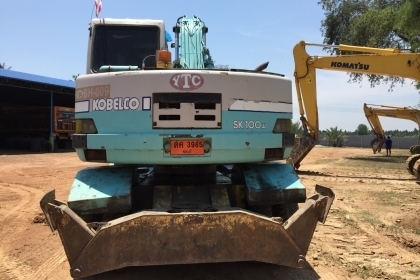 แบคโฮล้อยาง KOBELCO SK100W พร้อมหัวเจาะ +ปุ้งกี๋เอกสารเล่มทะเบียน