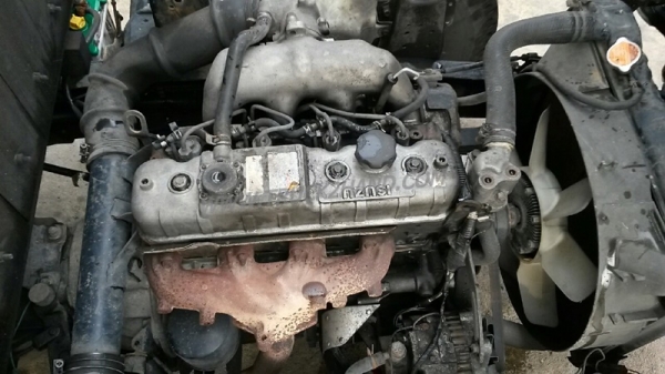 รถบรรทุก 6 ล้อ ISUZU NKR  ขนาด 85 แรงม้า แบบกระบะบรรทุกมีข้างเสริม