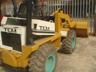 ละอองดาวแทรคเตอร์ ขายรถตักล้อยางยี่หัอ TCM 808