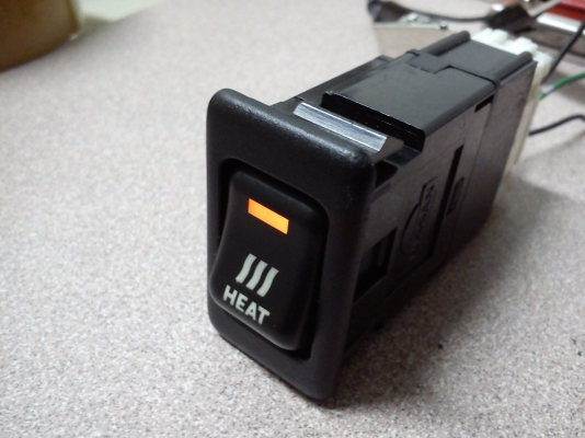 สวิตช์ HEAT ทรงตั้งแบบมีขอบของรถ NISSAN