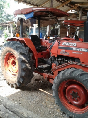 คูโบต้าM5000SUพร้อมใบมีดผานบุกผานพรวนและยางพร้อมกะทะอีกหนึ่งคู่ครับ