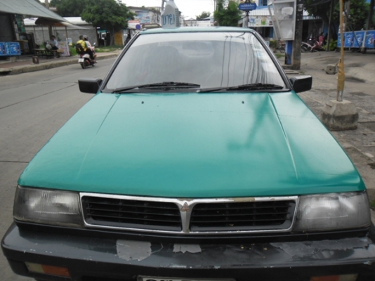 รถพร้อมใช้ ขี่กลับบ้านได้เลย แก๊ส น้ำมัน รถข้าราชการ รถสีเขียวเข้มแต่ติดสติกเกอเขียวอ่อนด้านบน