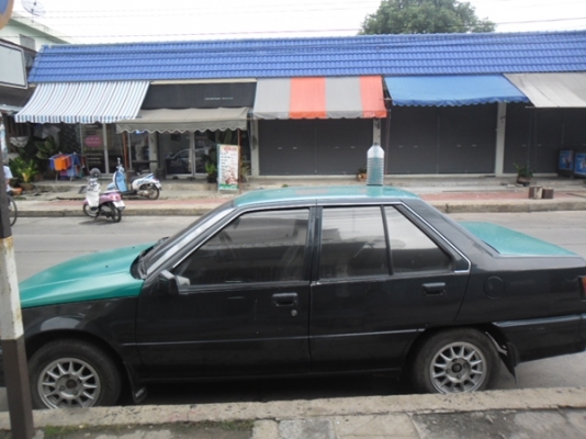 รถพร้อมใช้ ขี่กลับบ้านได้เลย แก๊ส น้ำมัน รถข้าราชการ รถสีเขียวเข้มแต่ติดสติกเกอเขียวอ่อนด้านบน