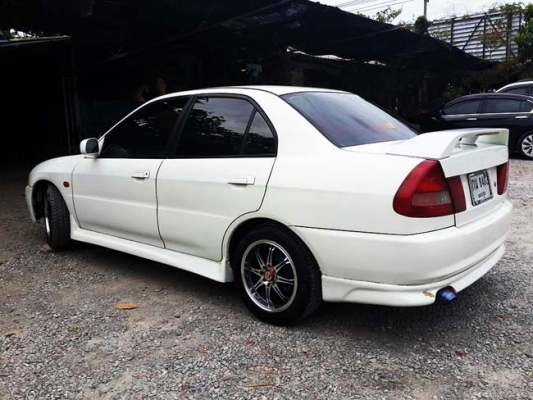 Mitsubishi lancer 1.8 ปี 97 auto lpg สีขาวสวย Mitsubishi lancer 1.8 ปี 97 auto lpg สีขาวสวย