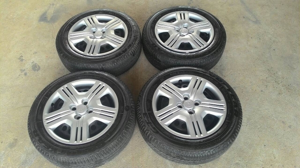 ล้อกระทะJazzฝาครอบพร้อมยางปี12