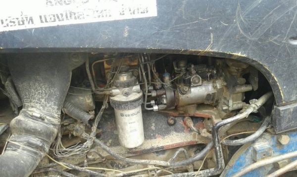 FORD TS 90 - 2 เพลา รถสภาพดีพร้อมใช้งานได้เลยครับ เครื่องแรงดีแห้งดีไม่แตกเยิ้ม เกียร์ข้าง กรองใหญ่แล้ว อุปกรณ์ครบ มีใบดันหน้า ผานพรวน 6 ติดตั้งพร้อมใช้งานได้เลย ช่วงล่างยางสภาพดีประมาณ 60\% พร้อมใช้งาน เอกสารเล่มทะเบียนครบพร้อม ราคาต่อรองได้ครับ