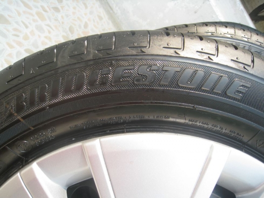 ขายกะทะล้อ  Mitsubishi Mirage ขอบ 14"  4/100 +ฝาครอบ+ยางปี 12 (081-3747940)