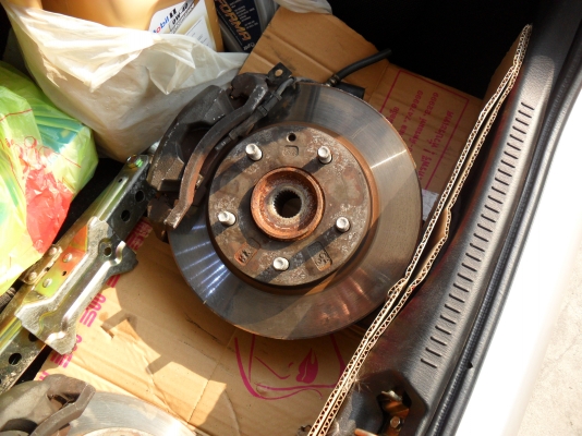 ดุมล้อ+ดิส+คาริปเปอร์  mazda 323