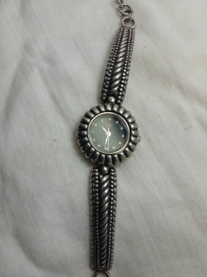 นาฬิกาตัวเรือนเงินแท้