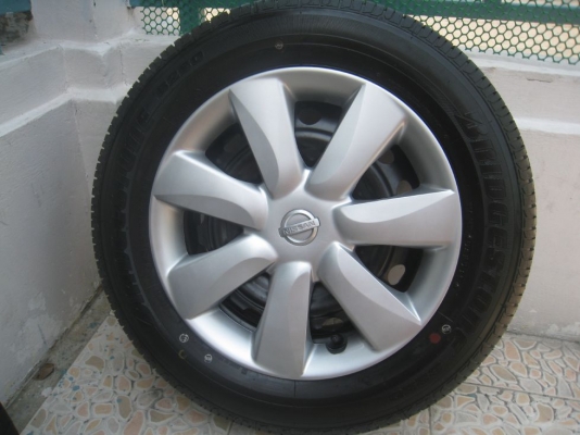 ขายกะทะล้อ nissan almera ขอบ14  4/100 +ฝาครอบ + ยางธันวาคมปี12 (081-3747940)