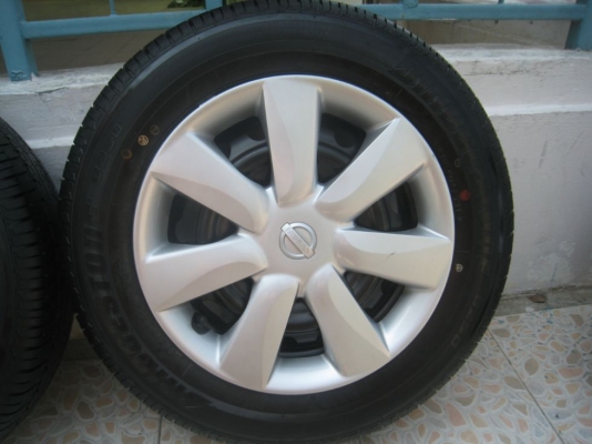 ขายกะทะล้อ nissan almera ขอบ14  4/100 +ฝาครอบ + ยางธันวาคมปี12 (081-3747940)