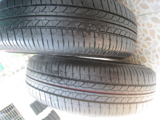 ขายกะทะล้อ nissan almera ขอบ14  4/100 +ฝาครอบ + ยางธันวาคมปี12 (081-3747940)