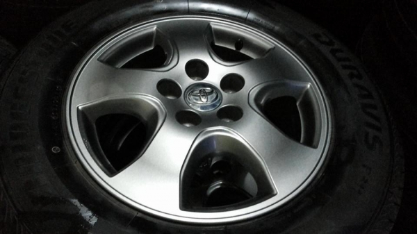 ล้อ vigo รมดำแท้ ยางบริสโตนดูราวิส 215 70 16 ปี2014