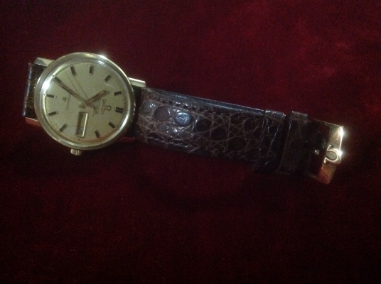 ขายนาฬิกา Vintage Omega หน้าเรียบ หอดูดาว สายหนังตัวล็อคสายเป็นทองคำ 18K ขายนาฬิกา Vintage Omega หน้าเรียบ หอดูดาว สายหนังตัวล็อคสายเป็นทองคำ 18K