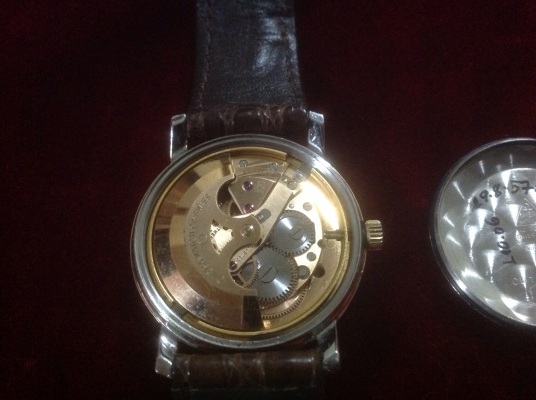 ขายนาฬิกา Vintage Omega หน้าเรียบ หอดูดาว สายหนังตัวล็อคสายเป็นทองคำ 18K ขายนาฬิกา Vintage Omega หน้าเรียบ หอดูดาว สายหนังตัวล็อคสายเป็นทองคำ 18K