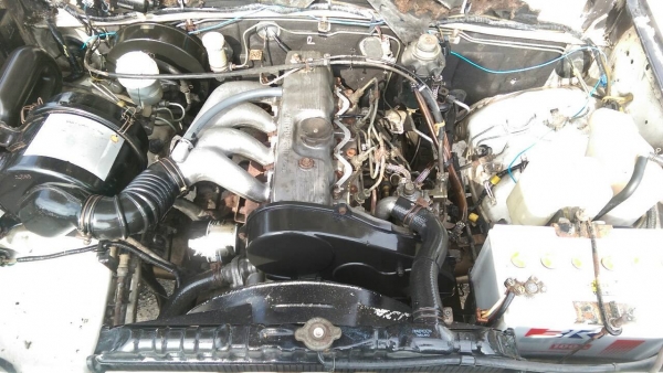 รถมิตซูสีขาว L200 ไซโคลน ตอนเดียว