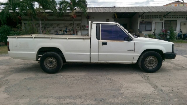 รถมิตซูสีขาว L200 ไซโคลน ตอนเดียว