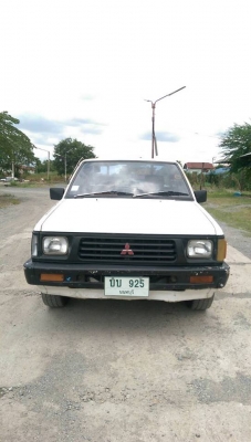 รถมิตซูสีขาว L200 ไซโคลน ตอนเดียว