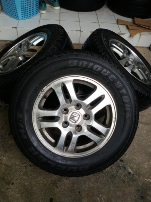 ล้อขอบ 15 พร้อมยาง 205 70 15 bridgestone ปี 12 ชุดล่ะ 3,800