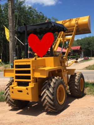 Komatsu 507  แขนยาว ตักขึ้น 10 ล้อรั้วสูงสี่เส้นได้นะคะ