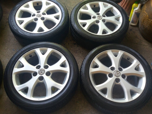 ล้อ mazda ขอบ 17 5รู 114 พร้อมยาง 205 50 17 bridgestone ปี 13 ชุดล่ะ 8500