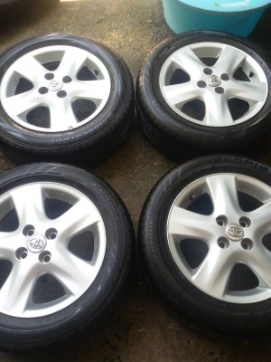 ล้อ toyota ขอบ 15 4รู 100 พร้อมยาง 185 60 15 bridgestone ปี 12 ชุดล่ะ 4500