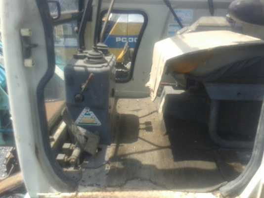 รถแบคโฮมีหัวเจาะ